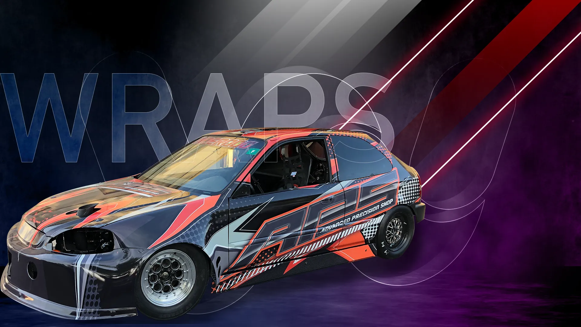 Race car with a full black, orange and grey vehicle wrap