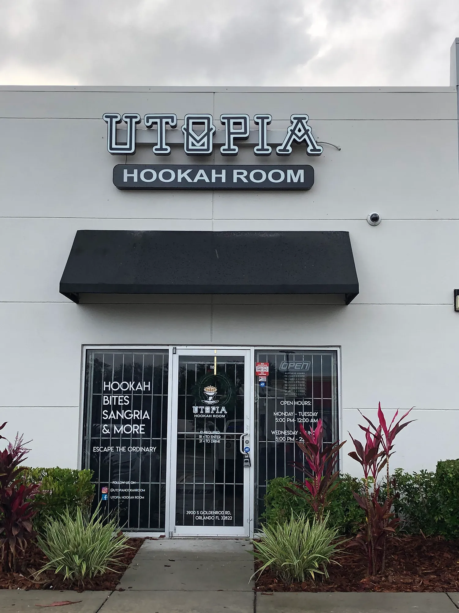 UTOPIA Hookah Room front-lit channel letters on a white storefront