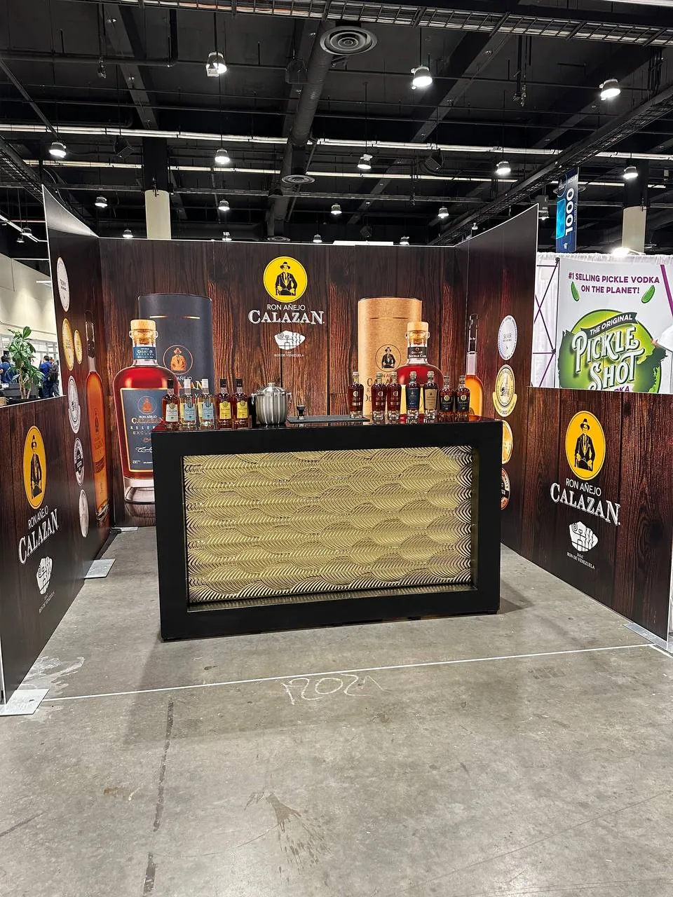 Second angle of the wrapped trade-show booth with its bar counter