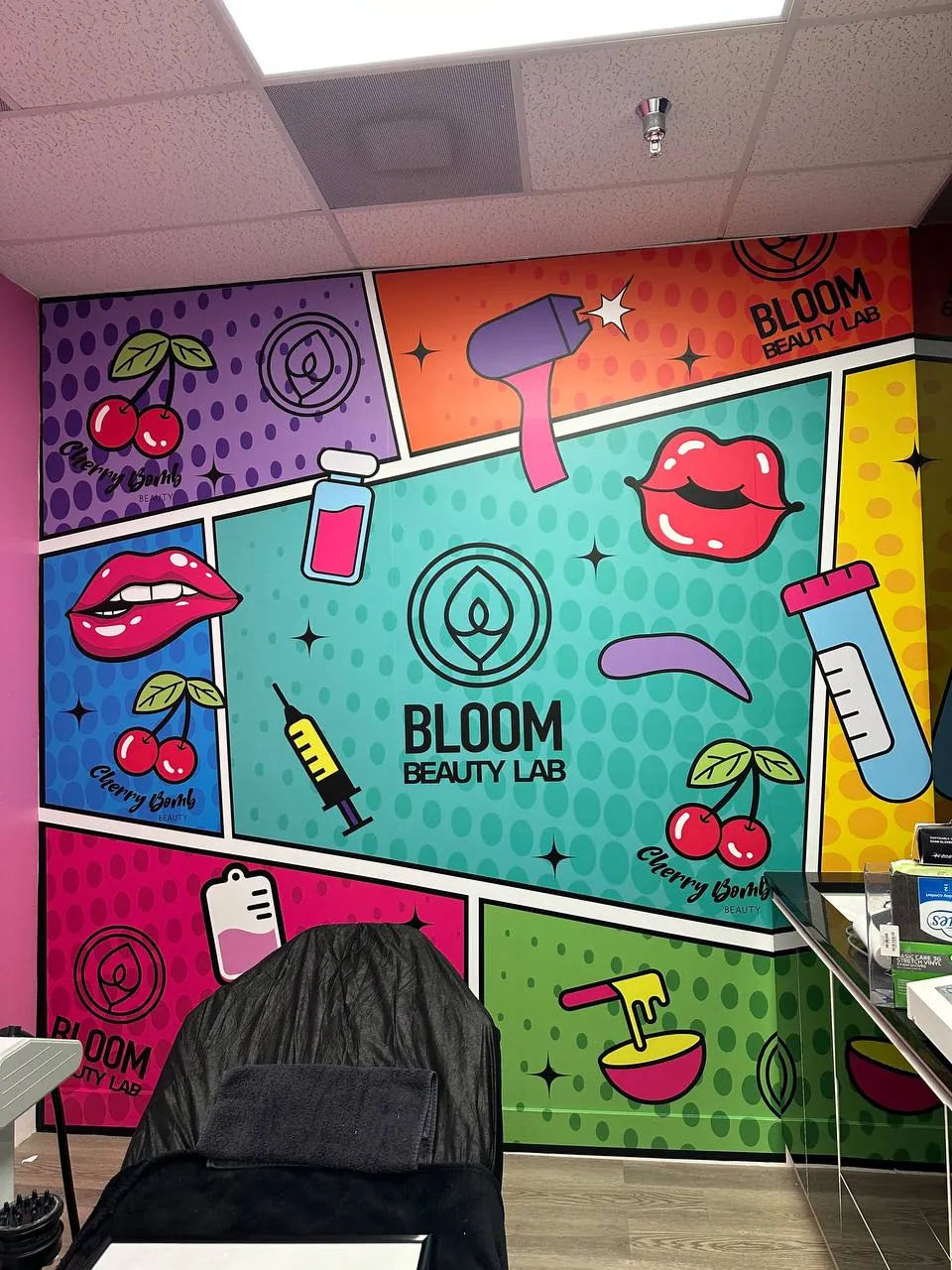 Bloom Beauty Lab colorful pop-art wall wrap in a salon