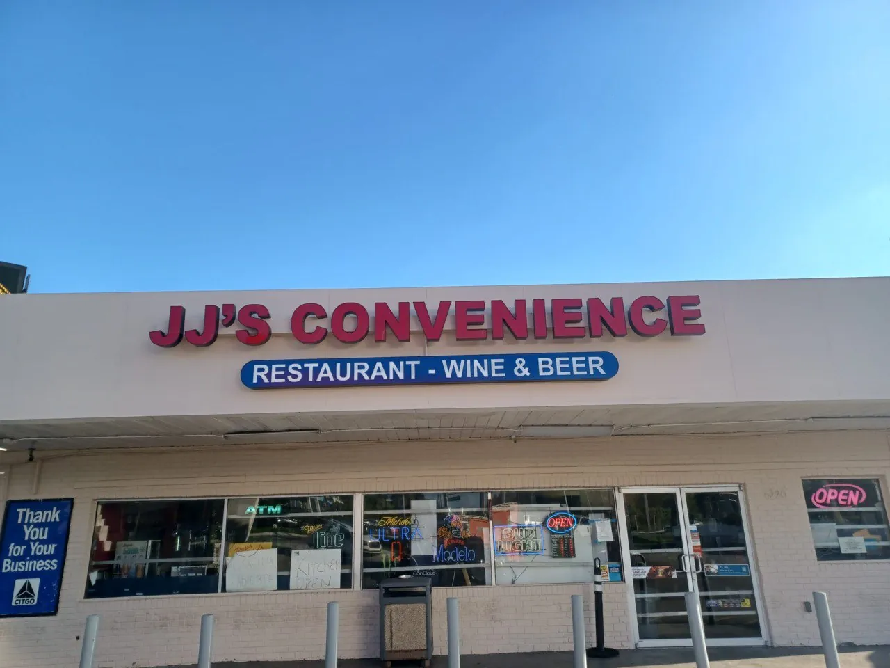 JJ's Convenience restaurant, wine and beer storefront sign